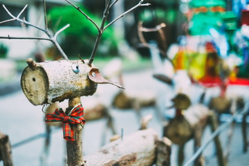 Decorative Santa reindeer  made of wood logs and branches. Christmas concept
