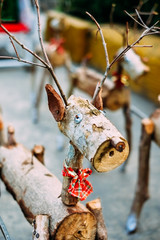 Decorative Santa reindeer  made of wood logs and branches. Christmas concept