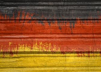 Germany flag design concept. Flag textured by grungy wood pattern. Image relative to travel and politic themes