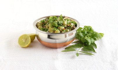 Snake gourd curry, a healthy Indian vegetarian, traditional and popular side dish.