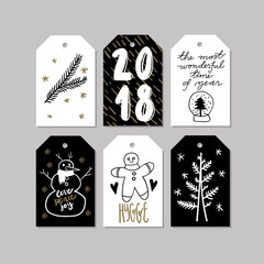 Set of doodle Christmas greeting tag. Vector hand drawn cute icons. Scandinavian style. Xmas tree,snowman, gingerbread cookie snow globe and lettering. New Year scrapbooking. Holiday festive party.