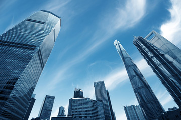 Fototapeta na wymiar Looking up at business buildings in Lujiazui,Shanghai,China