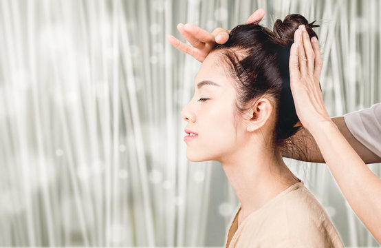 Women Is Having Head Massage Relaxation On Bokeh Background