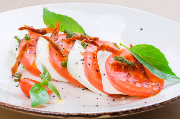 Caprese salad or Buffalo mozzarella with tomatoes