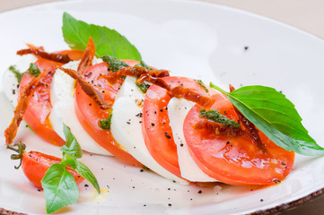 Caprese salad or Buffalo mozzarella with tomatoes