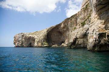 Fototapeta na wymiar Malta cliffs at Blue Grotto from sea level