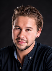 Fototapeta premium Portrait of smiling handsome man