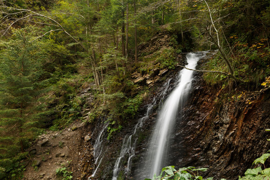 The beautiful waterfall in forest, long exposure in Carpathian mountains