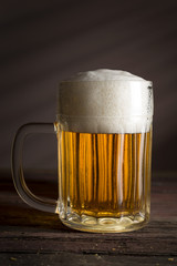 Mug of cold light beer