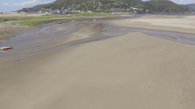 A Relatively Low Aerial Shot Flying Down Fairbourne Estuary