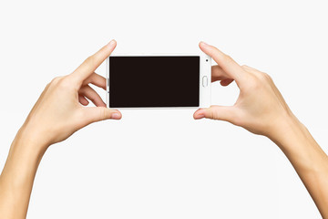 Mockup of female hands holding cellphone with black screen at isolated background.