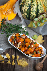 Baked pumpkin with honey, walnut and thyme..