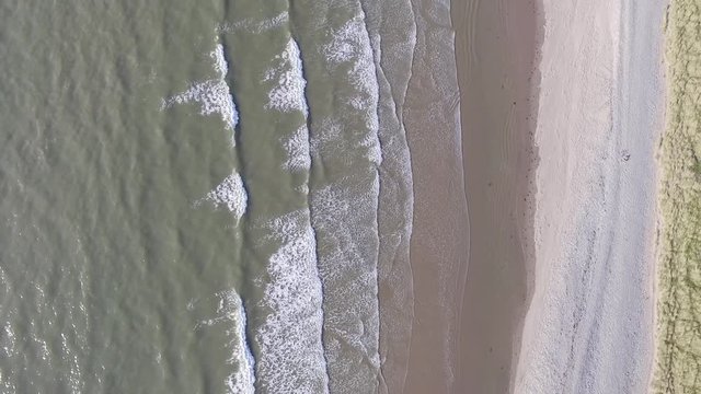 A Downward Aerial Shot of Waves at Fairbourne Beach
