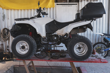 Repair service station of extreme transports ATVs , motorbikes, scooters