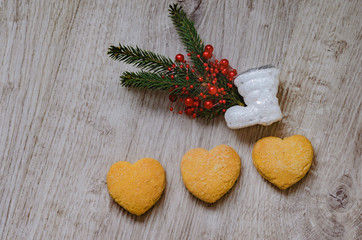 Christmas cookies , fir branch, and santa boot