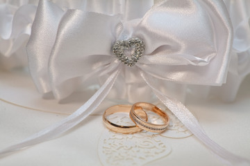 Wedding accessories with two golden rings
