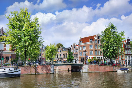 Renovated mansions at Amsterdam ancient canal belt, The Netherlands