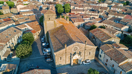 Fototapeta premium Aerial top view of Bram medieval village architecture and roofs from above, Southern France 