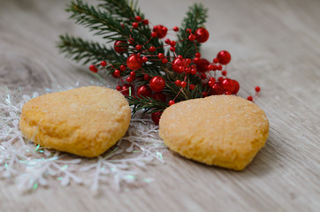 Obraz na płótnie Canvas Christmas cookies and fir branch