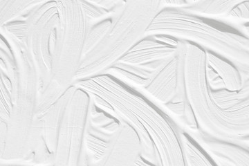 A white background with a wave pattern. Texture of the painted surface.