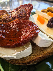 italian starters - blue cheese, dried tomatoes, dried fruits, camembert, 