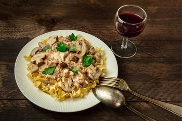Mushroom beef stroganoff with egg pasta and red wine
