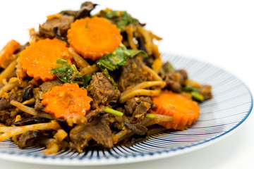 fried beef noodle food on the table