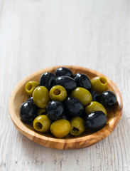 olives in a wooden bowl