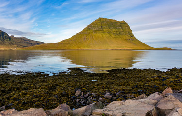 Kirkjufell (463m) is a beautifully shaped and a symmetric, free standing mountain. Its name means 'Church Mountain'.