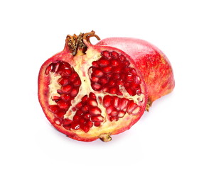 Pomegranate cut in half isolated on white background