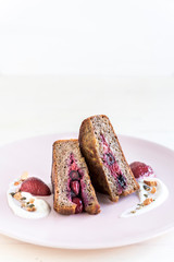 Sweet toast sandwicheswith berries served on the plate