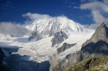 Fototapeta na wymiar Snowy peak of Mont Blanc in french Alps with fresh snow