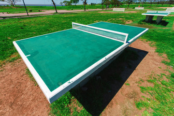 Close-up of tennis table in a park