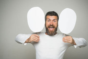 Guy or bearded man on grey background.