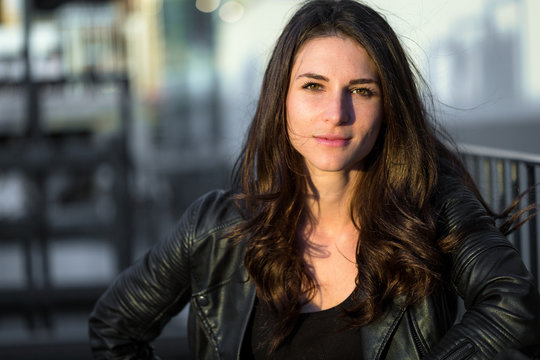 Strong Tough Girl Portrait In A Leather Jacket, Biker Rocker Type Female