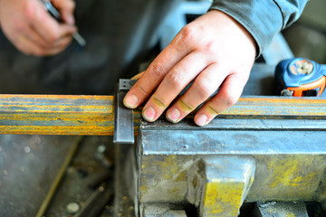 metal sawing close up, angled marking