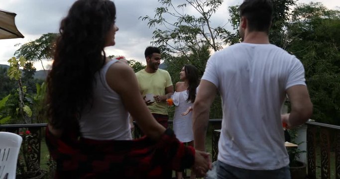 Couple Holding Hand Join People Having Barbecue Party On Summer Terrace In Tropic, Friends Group Communication Slow Motion 60