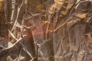Brown rough crumpled paper background