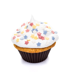 cupcake muffin with cream and icing isolated at white background