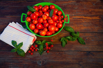 fresh ripe tomatoes on wooden table