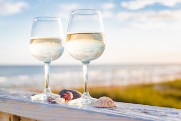 Wine at the beach with sea shells