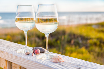 Wine at the beach with sea shells - 176407736