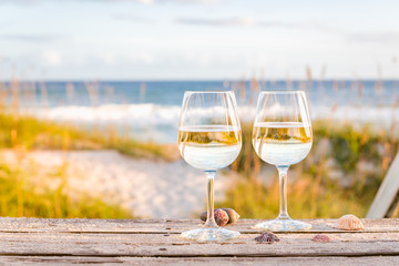 Wine at the beach with sea shells - 176407784
