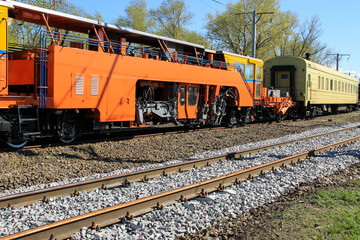 Obraz premium View on the maintenance train on railroad track