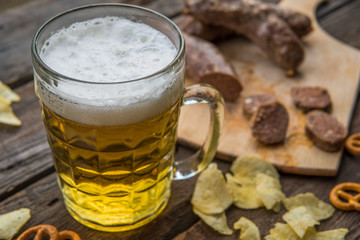 Beer, sausages, pretzels and chips. Octoberfest theme