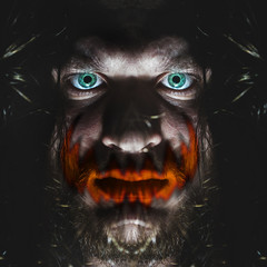 Portrait of a man with a green eye for horror or halloween. Joker