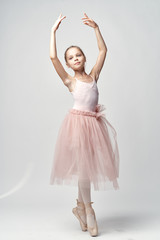 girl in pink tutu, ballerina on white isolated background