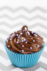 Homemade cupcake with chocolate cream
