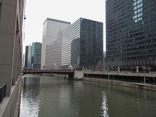 Fototapeta na wymiar buildings and bridges in gray early winter day 