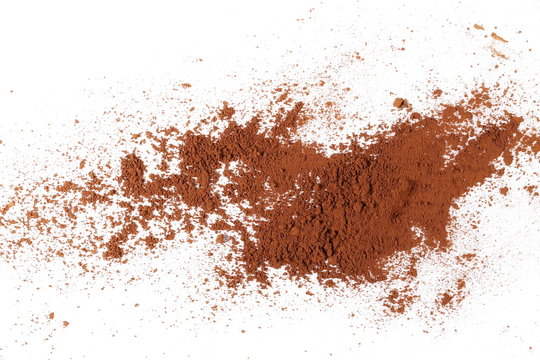 pile cocoa powder isolated on white background, top view